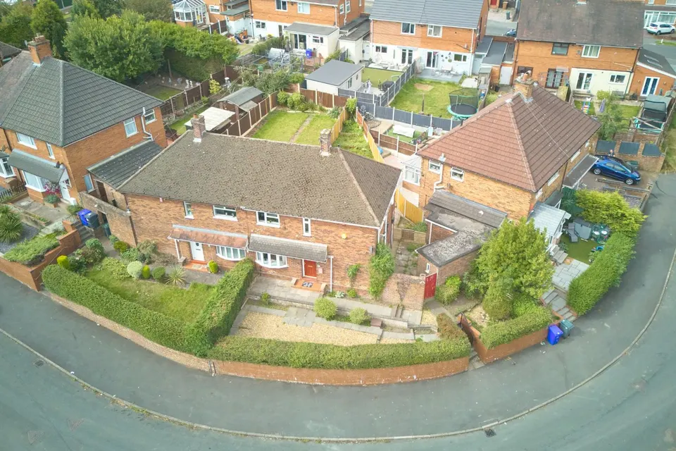 Aerial view of semi-detached houses on a residential street